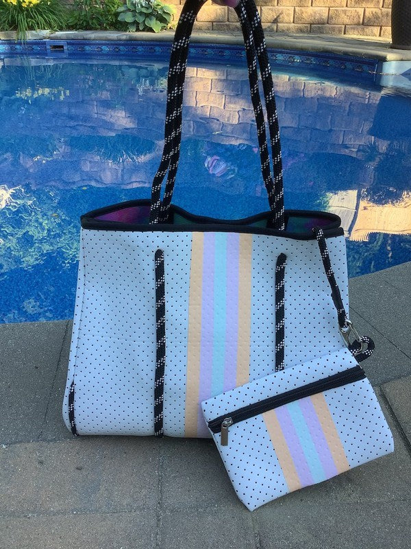 How cute is this neoprene tote! If you love the Louis Vuitton print, you'll  love this. Perfect for summer ☀️ Only $60 🤩 • • • #iconicsalonandboutique, By Iconic Salon and Boutique